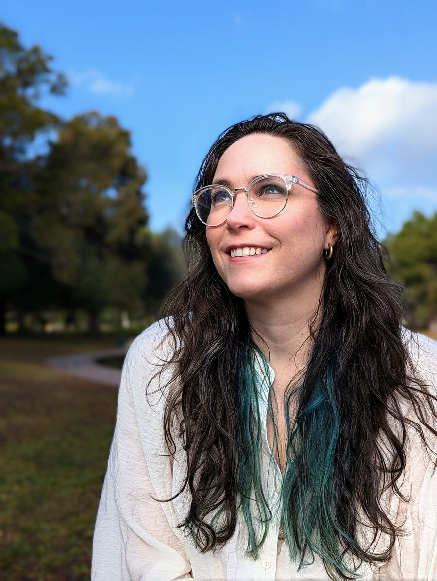 Portrait of Jennifer Holmquist smiling outdoors